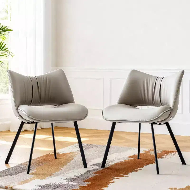 Chaise de salle à manger chic et moderne, rembourrée, avec dossier incurvé et pieds en métal noir - Gris clair